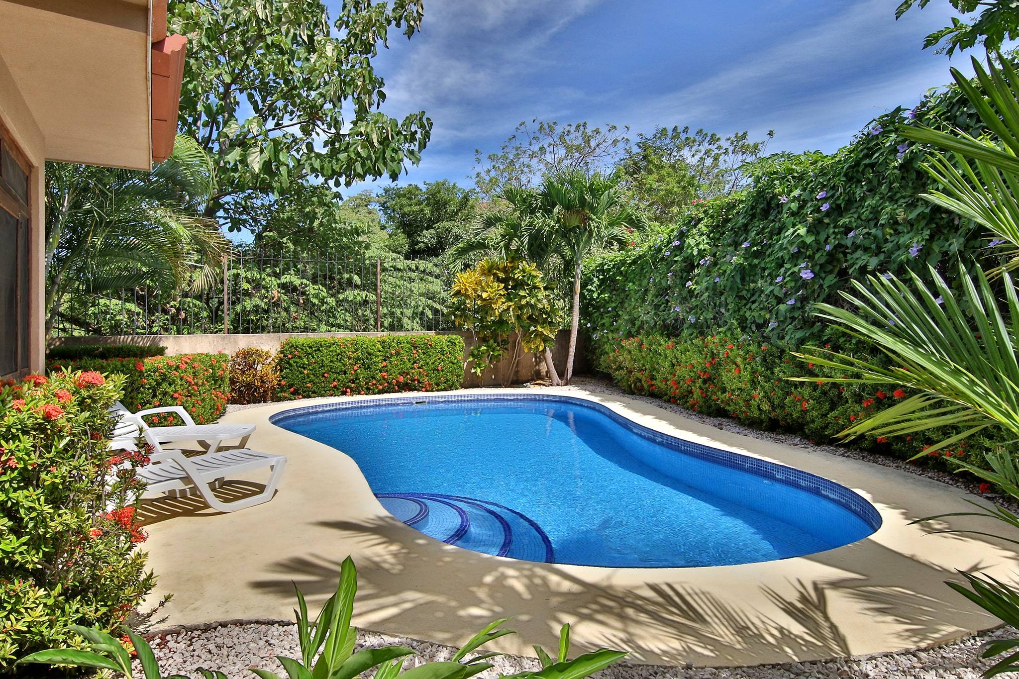 Family home nestled in the back of the desirable gated community in Flamingo beach $599,000